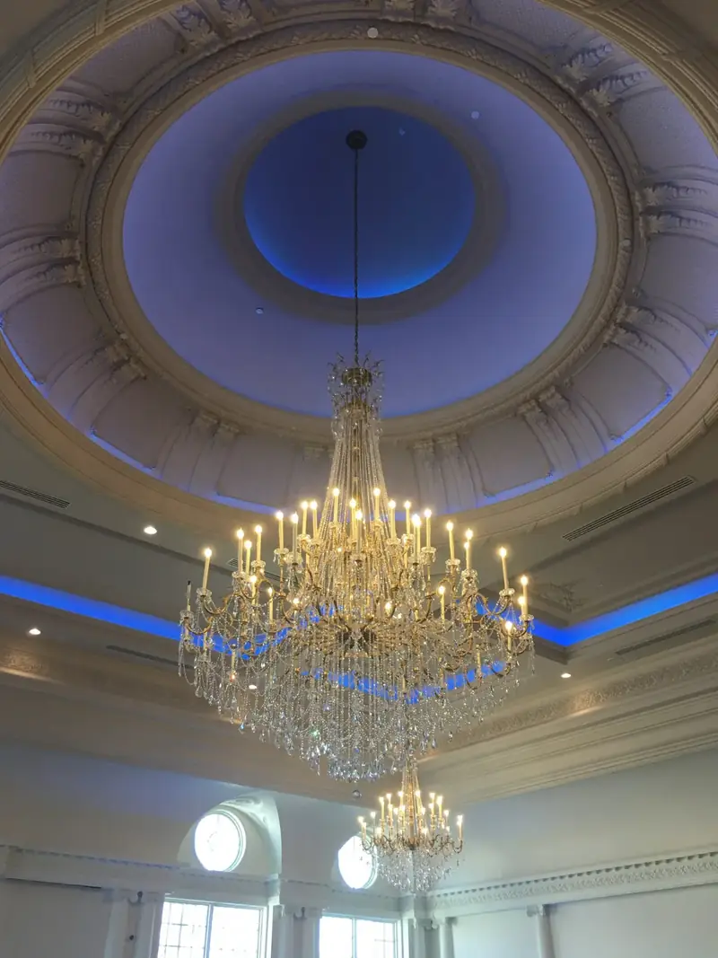 Park Chateau Main Hall, East Brunswick, NJ: crystal chandelier beneath a blue-lit dome
